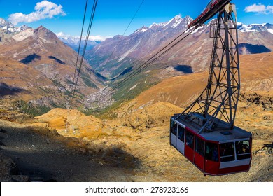 Cable Car To Matterhorn Mountain In Zermatt , Switzerland In A Summer Day