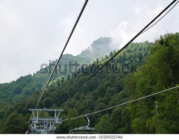 Cable car, cable\
car, cable car, mountain\
road