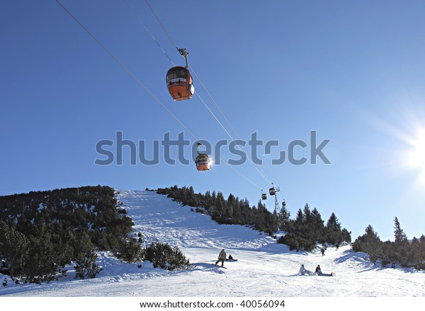 Cable car over mountain landscape. Rila\
mountains, ski resort Borovets,\
Bulgaria