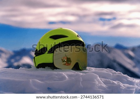cable car reflected in ski goggles