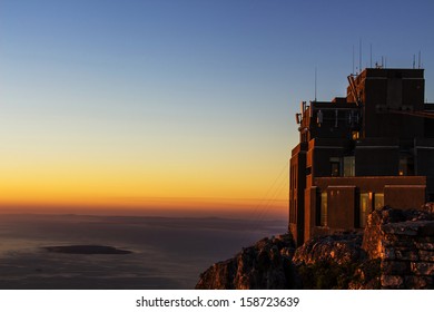 The cable car station at the top of Table Mountain with Robben Island in the background - Shutterstock ID 158723639