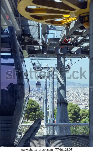 Cable car\
vehicles are motorless and engineless and they are pulled by a\
cable that is rotated by a motor\
off-board.