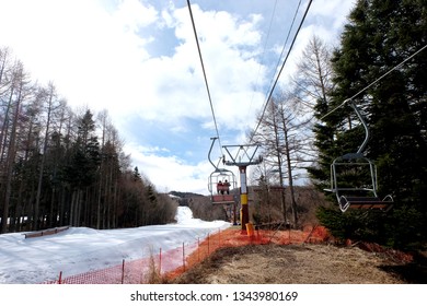 Cable Cars Towards Mountains With Snow. Fujiten Snow Resort.