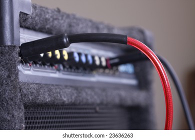 Cable connected to a guitar amplifier