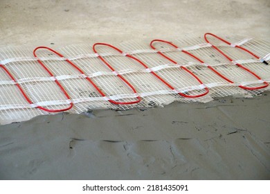 Cable Electric Underfloor Heating Partially Under Cement Screed Close-up