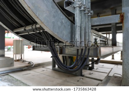 The cable from cable ladder to rigid steel conduit