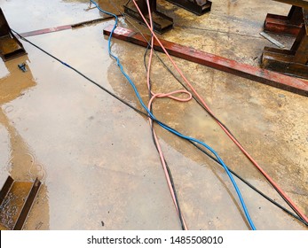 The Cable Lay Down On Wet Floor It Meaning Unsafe Condition Of Work At Ground Floor