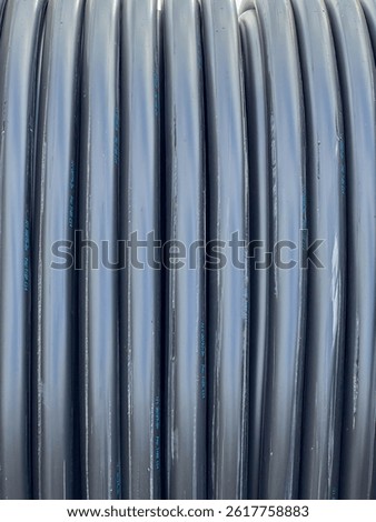 Cable on a large drum during the construction of an underground electrical network.