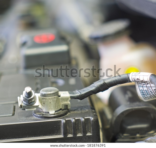 Cables connect to a car battery
