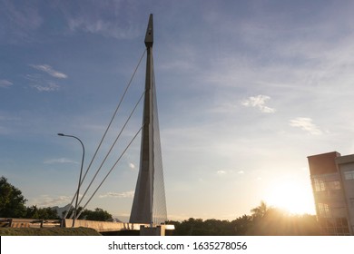 Cable-stayed bridge with sunset in the background