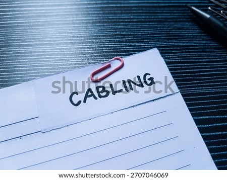 Cabling writting on table background. 