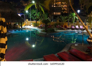 Cabo San Lucas, Mexico - August 11th, 2019 Illuminated At Night Blue Pool In The Marina Fiesta Tourist Resort And Spa