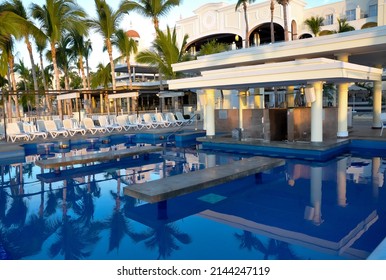 Cabo San Lucas, Mexico - February 26, 2022: Empty Pool Bar Restaurant In Riu Palace Hotel.