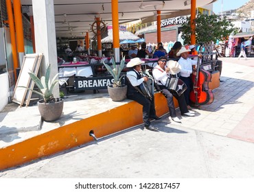 Cabo San Lucas, Mexico/USA - June 2019: Mexican Band Sitting On The Side Of Senor Frogs Fun, Food, & Clothes Restaurant Bar On Marina In Cabo San Lucas Mexico