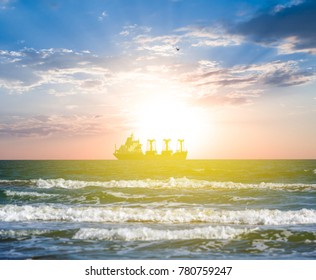 Cabotage Ship In A Sea At The Sunset