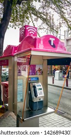 Cabramatta, Australia - Jun 7, 2016: A public telephone booth own by the Telstra Corporation. This modern facility  supports hotspot wireless internet access through smartphone for account holders.