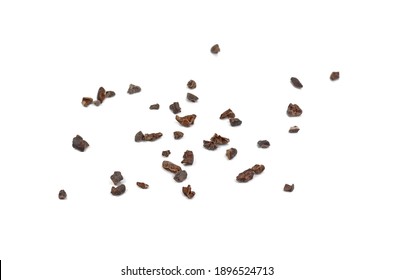 Cacao nibs, a pieces of broken cocoa beans isolated, top view