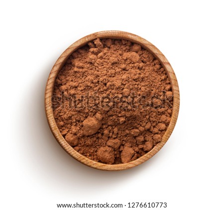 Cacao. Pile of cocoa powder in wooden bowl isolated on white background, top view
