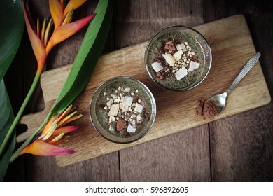 Cacao Spinach  Smoothie Topped With Buckwheat and Coconut flakes.