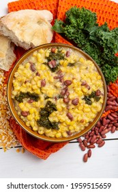 Cachupa, A hearty vegan delicious Cape Verdean stew packed with fresh, flavor veggies, traditional hominy corn soup or stew and Portuguese bread