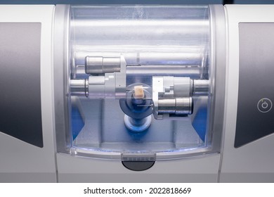 CAD CAM dental computer-aided machine. Digital modern dental laboratory for prosthesis and crowns milling