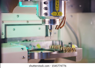 Cad Cam Machine In Dental Laboratory. Production Of Dental Crowns And Dentures. Milling Dental System With Program Control. Dentistry.