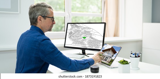 Cadastral Survey Map On Office Computer. Land Valuation