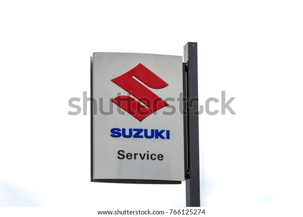 Cadolzburg,\
GERMANY- AUG 12: SUZUKI logo, dealer in Furth, Germany. Suzuki\
Motor Corporation is a Japanese multinational corporation\
headquartered in Minami-ku, Hamamatsu,\
Japan.