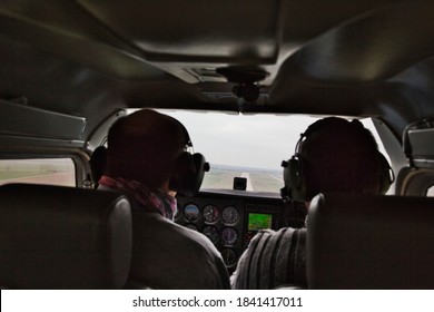 CAEN, FRANCE - JUNE Circa, 2015. View From Over Snow Covered Peaks While Flying In Small Plane CESNA. Lesson For New Pilot, With Airplane Teacher.