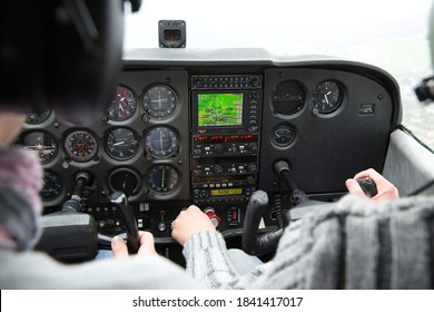 CAEN, FRANCE - JUNE Circa, 2015. View From Over Snow Covered Peaks While Flying In Small Plane CESNA. Lesson For New Pilot, With Airplane Teacher.