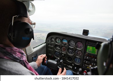 CAEN, FRANCE - JUNE Circa, 2015. View From Over Snow Covered Peaks While Flying In Small Plane CESNA. Lesson For New Pilot, With Airplane Teacher.