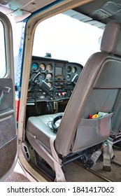 CAEN, FRANCE - JUNE Circa 2016 - Part Of Small Plane On Aiport Field. CESNA Blue White Red, With Opened Door, Waiting For Customers And Pilot