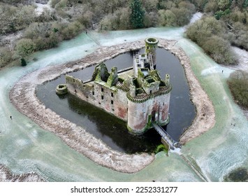 Caerlaverock Castle is a moated triangular castle first built in the 13th century. It is located on the southern coast of Scotland
