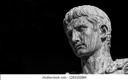 Caesar Augustus, first emperor of Ancient Rome. Old bronze statue in the Imperial Forum (Black and White with copy space) - Shutterstock ID 1283102884