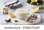 Caesar Dressing: A creamy, tangy dressing made from anchovies, garlic, lemon juice, Dijon mustard, Worcestershire sauce, and Parmesan cheese, perfect for salads and wraps.