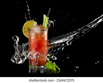 Caesar Drink cocktail water splash on black background