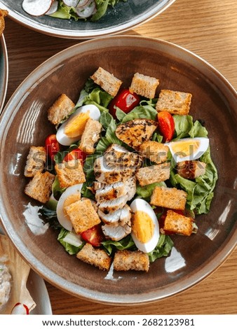 The Caesar salad with chicken