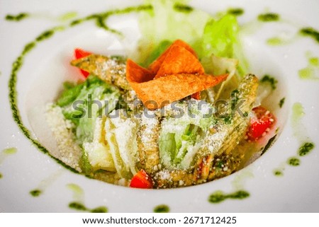 caesar salad with chicken, close-up, selective focus