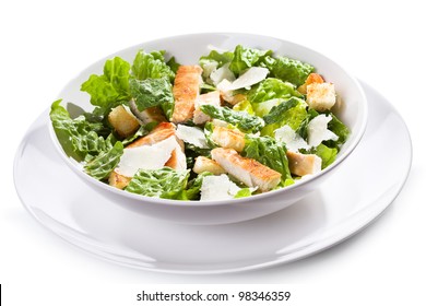 Caesar Salad With Chicken And Greens On White Background