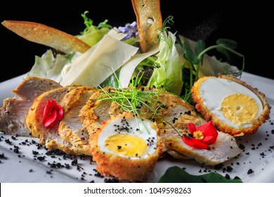 Caesar Salad With Chicken On A Dark Background