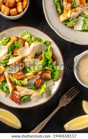 Caesar salad with chicken and Parmesan, shot from above