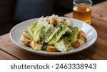 Caesar Salad: Classic salad with romaine lettuce, croutons, Parmesan, and Caesar dressing.
