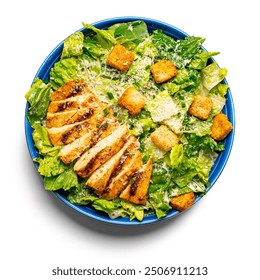 Caesar salad, a delicious salad with chicken, crackers and herbs on a beautiful plate isolated on white background  - Powered by Shutterstock