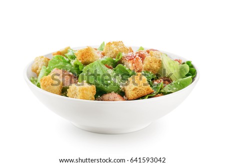 Caesar salad on white background. Healthy food.