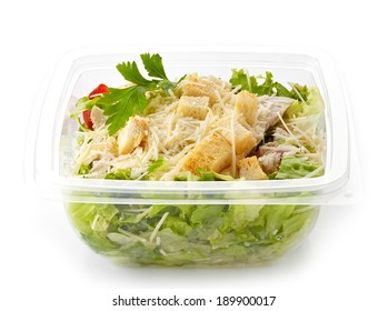 Caesar Salad In A Plastic Take Away Box Isolated On White