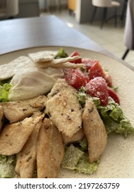 Caesar salad with poached egg