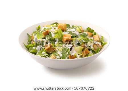 Caesar salad in a white plate