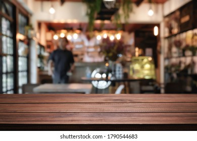 Cafe Bistro with Empty wood table for product display montage. - Shutterstock ID 1790544683