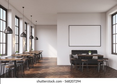 Cafe interior with a large sofa near a white wall, a row of tables with chairs near windows and a big horizontal poster on the wall. 3d rendering. Mock up.