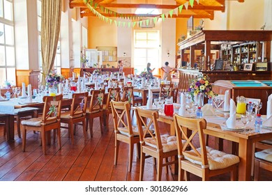 Cafe interior with the served tables
